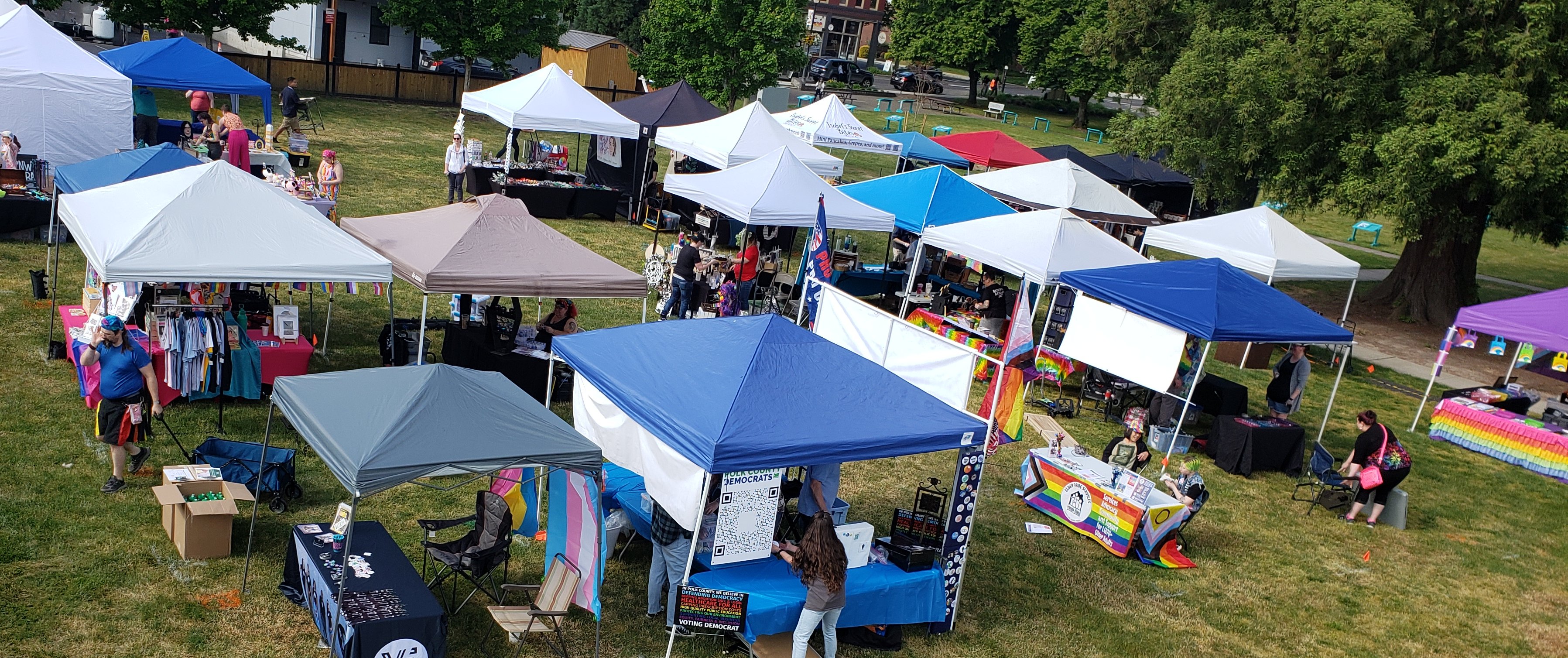 Arial photograph of vendors finilizing their setup at the Monmouth Has Pride celebration
